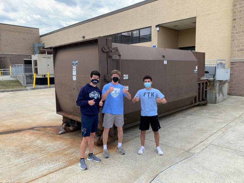 Members of the Lancaster Chapter of the IRCEPPI perform their hourly scan of a local high school's dumpster for recyclable items.